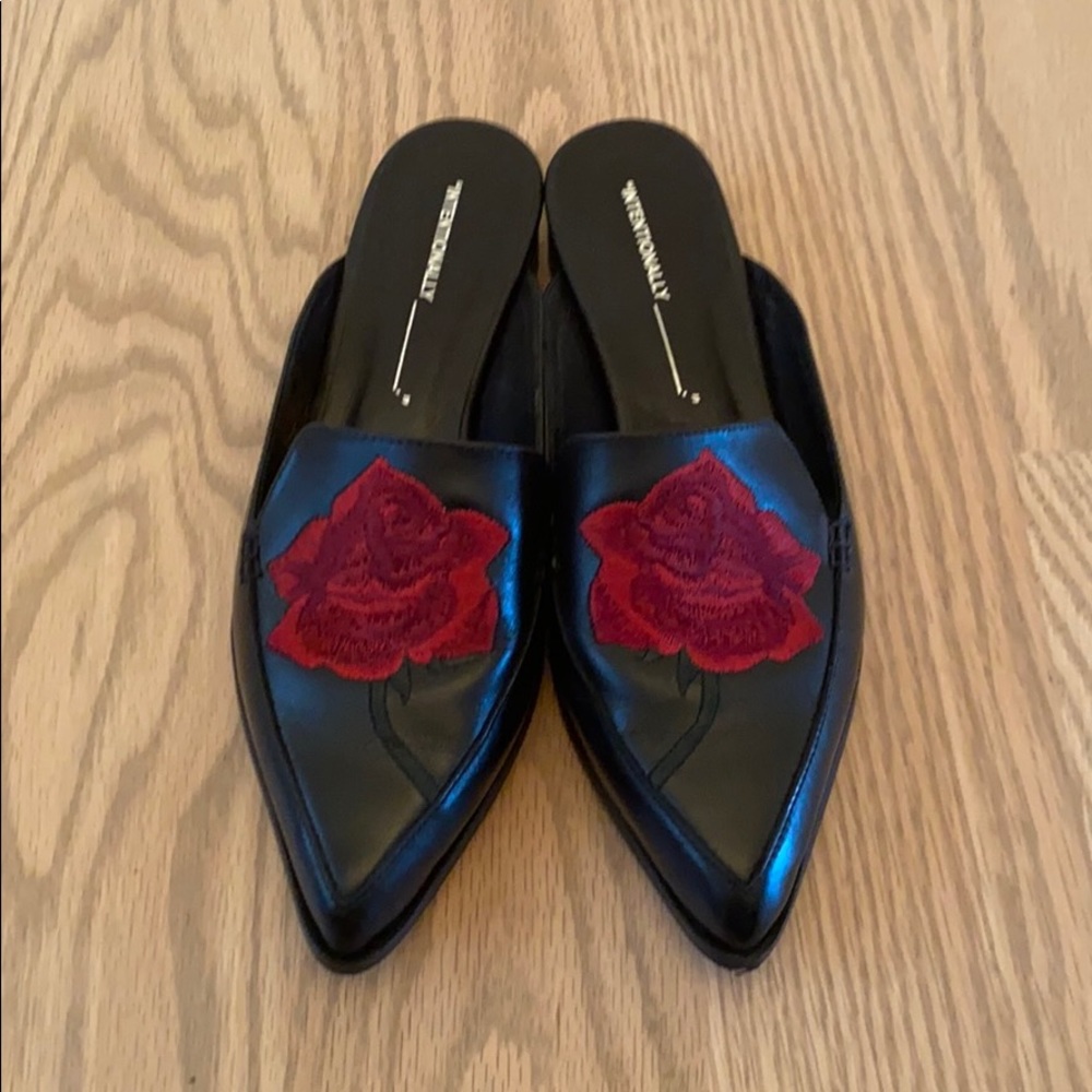 Intentionally black mule with rose detail